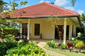 Beautiful bungalow with a communal outdoor pool and 2 km from the sandy beach